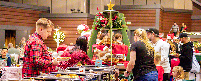 guests dishing food at buffet
