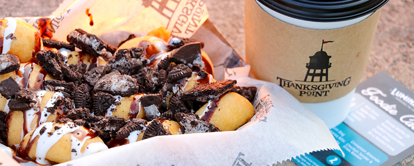 mini dounuts topped with oreos next to coffee cup with thanksgiving point logo