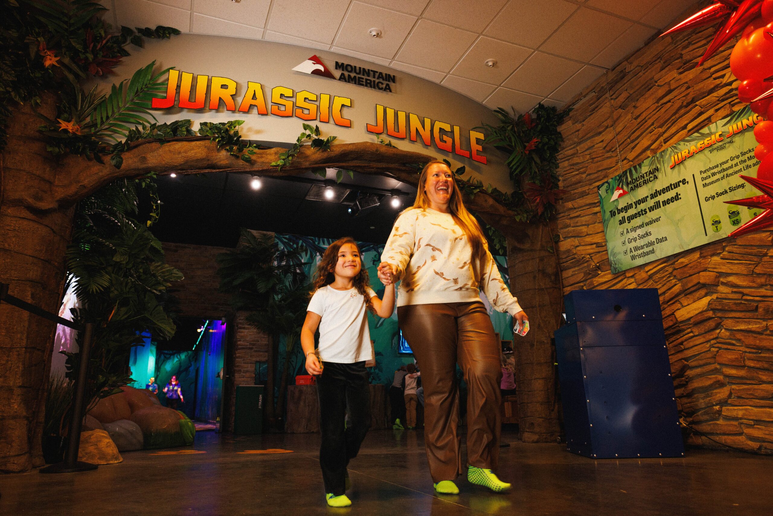 Family exploring Jurassic Jungle