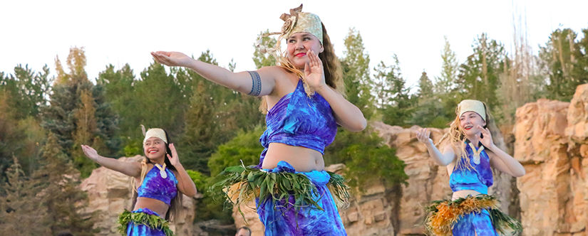 3 women outside traditional polynesian dance 