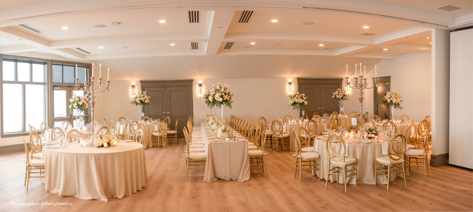 Garden Room at Ashton Gardens, set for wedding with long and round tables and gold chairs