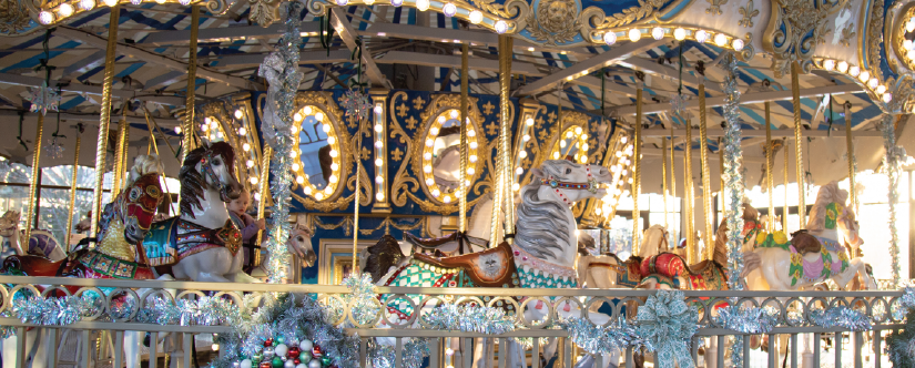 carousel with winter garland and decorations