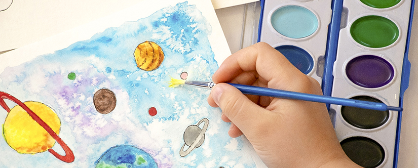 child hand watercolor painting space
